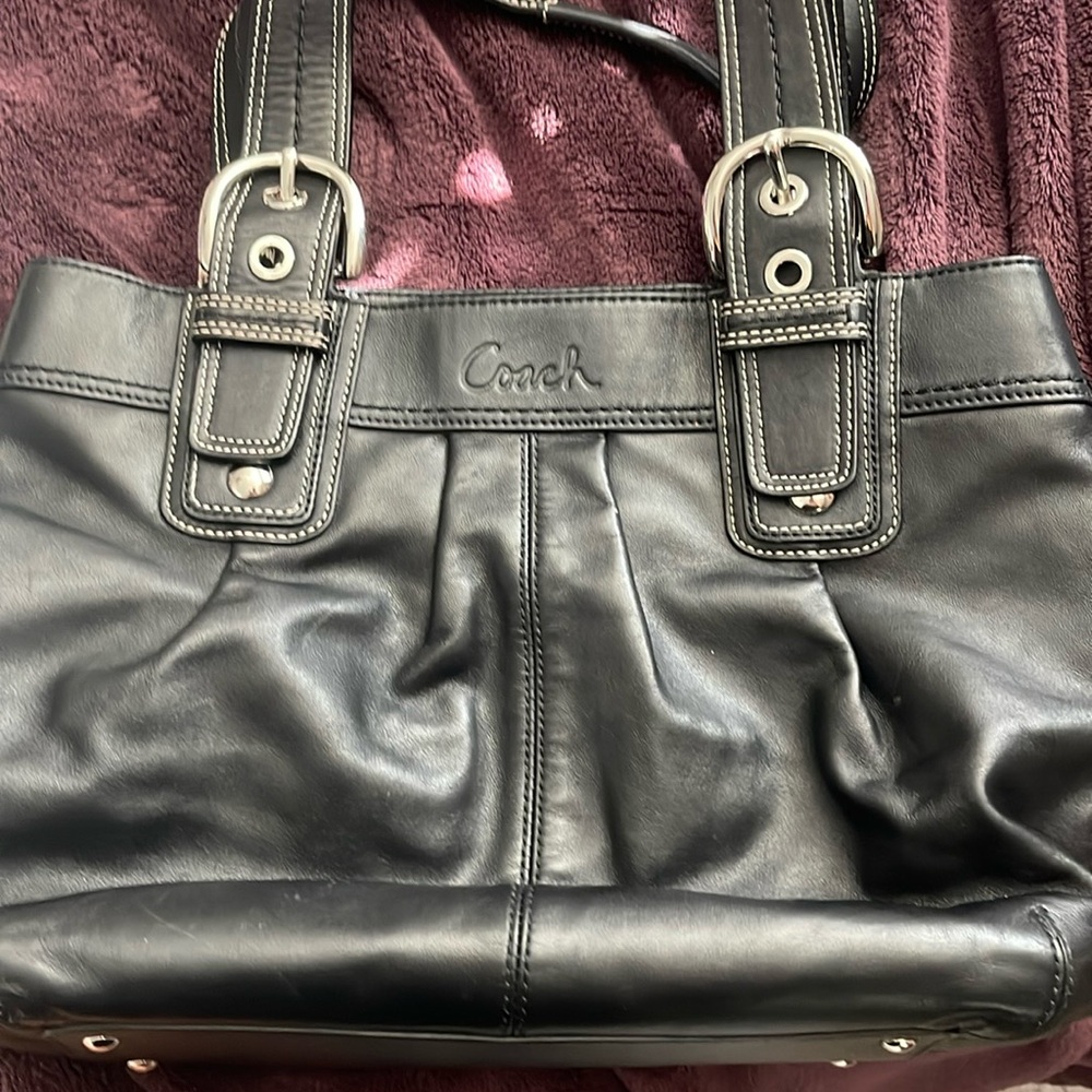Black leather coach bag with duster bag